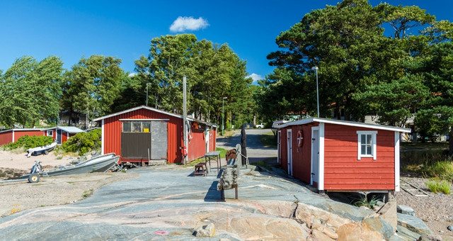 Red fishermen huts in the coast of Hanko