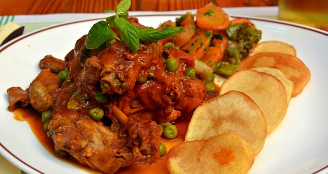 A traditional rabbit stew dish served at a restaurant in Gozo