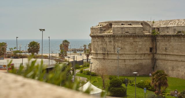 The promenade of Varco Fortezza and the Fort of Michelangelo in the port of Civitavecchia