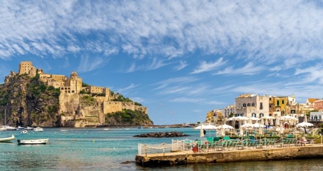 The village of Ischia and the Aragonese Castle in the background, Italy