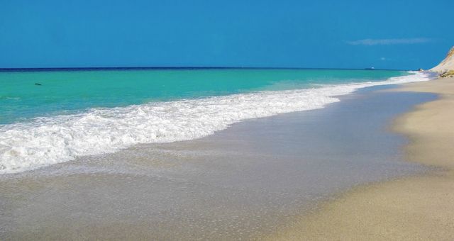 The turquoise waters of San Saba beach in Messina