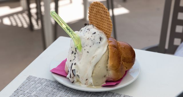 Brioche filled with ice cream in a bar in Messina, Italy