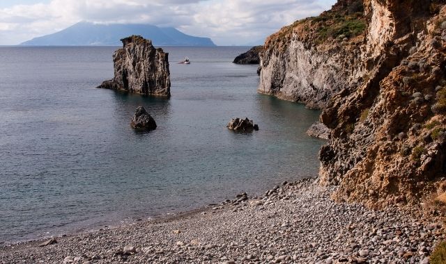 The rocky beach of Cala Junco, in Panarea, Italy