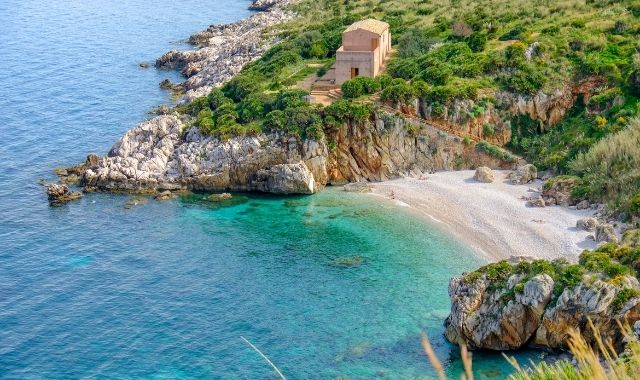 The beach of Cala Tonnarella dell'Uzzo, in Trapani, Sicily, Italy