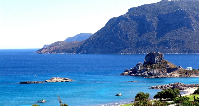 Rocks in the deep blue sea of Kos, Greece