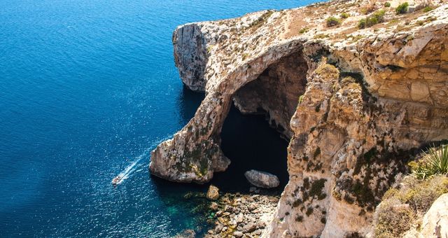 View of the natural arch of the Blue Grotto in Malta