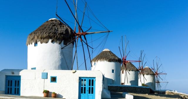 White windmills in the Chora of Mykonos, Greece