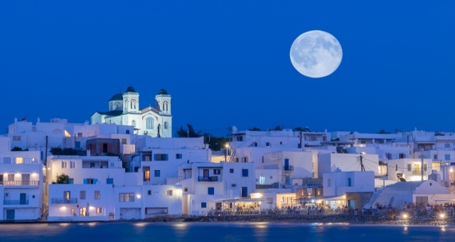 Full moon above the town of Naoussa, Paros, Greece