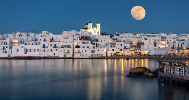 Harbor of Naousa, Paros, full moon, blue sky, white houses, church