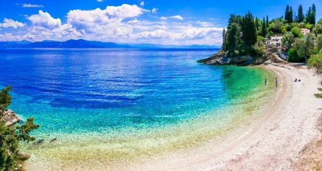 Emerald waters at Levrechio beach in Paxi, Ionian Islands, Greece