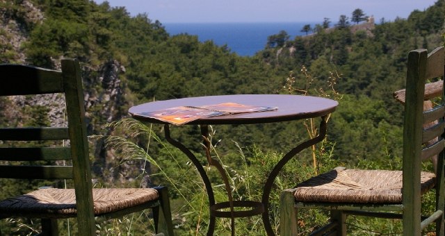 Enjoying the view from a quaint cafe in Samos, Greece