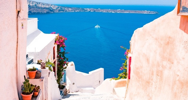 Houses of traditional Cycladic architecture overlooking the sea in Santorini, Greece