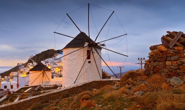 The beautiful windmills of Chora dressed in the sunset light, Serifos, Greece