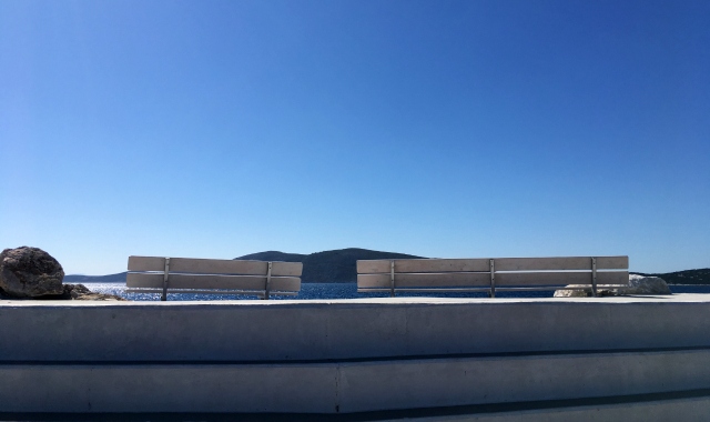 Bench with a sea view at the port of Linaria in Skyros