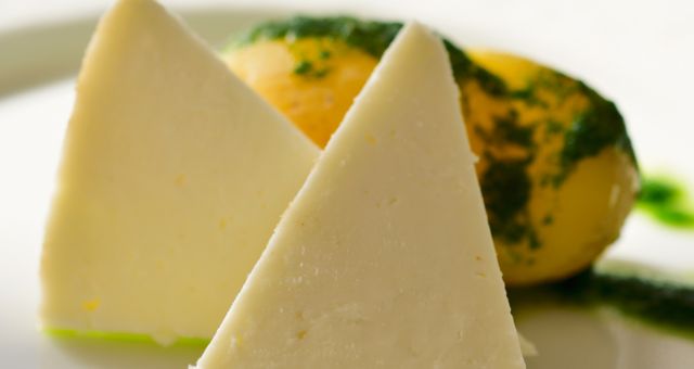 A slice of Majorero cheese served on a plate