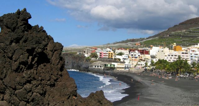 The beach of Puerto Naos in La Palma with black sand, Spain