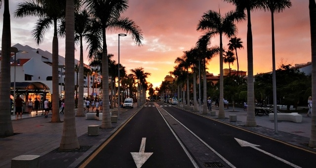 Sunset over the streets of Playa de las Américas, in Tenerife, Spain