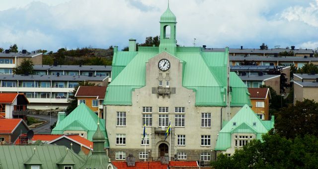 The city hall or Stadshus of Strömstad surrounded by other buildings