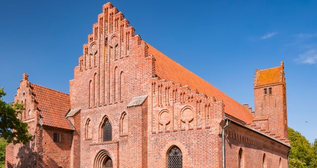 St. Peter’s Church surrounded by trees in Ystad, Sweden