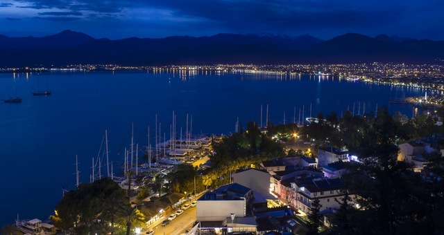 The port and city of Fethiye after sunset