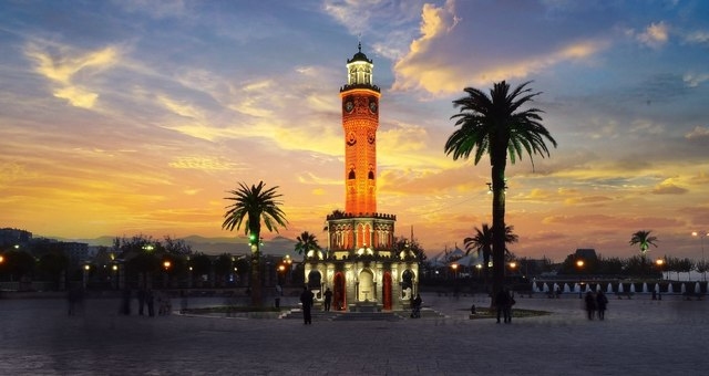 The illuminated İzmir clock tower at sunset, Turkey